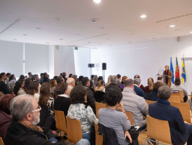 pessoas numa conferência